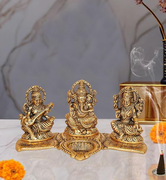 Amazon Brand - Umi Metal Ganesha, Lakshmi and Saraswati Idol Sculpture, Golden (5.5" Height x 10.0" Width)