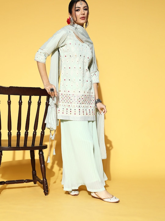 Libas - Floral Poly-Georgette Short Kurti & Flared Pants with Potli Bag