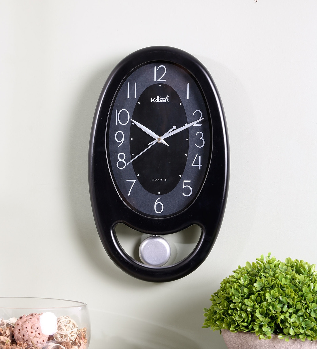 Black Plastic Oval Shape Pendulum Clock, By Kaiser