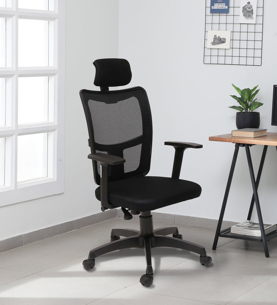 Rei Breathable Mesh Ergonomic Chair in Black Colour with Headrest, By Valuewud from Pepperfry