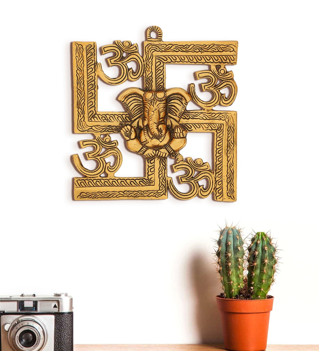 Gold Metal Lord Ganesha On Om Swastik Wall HangingShare By eCraftIndia