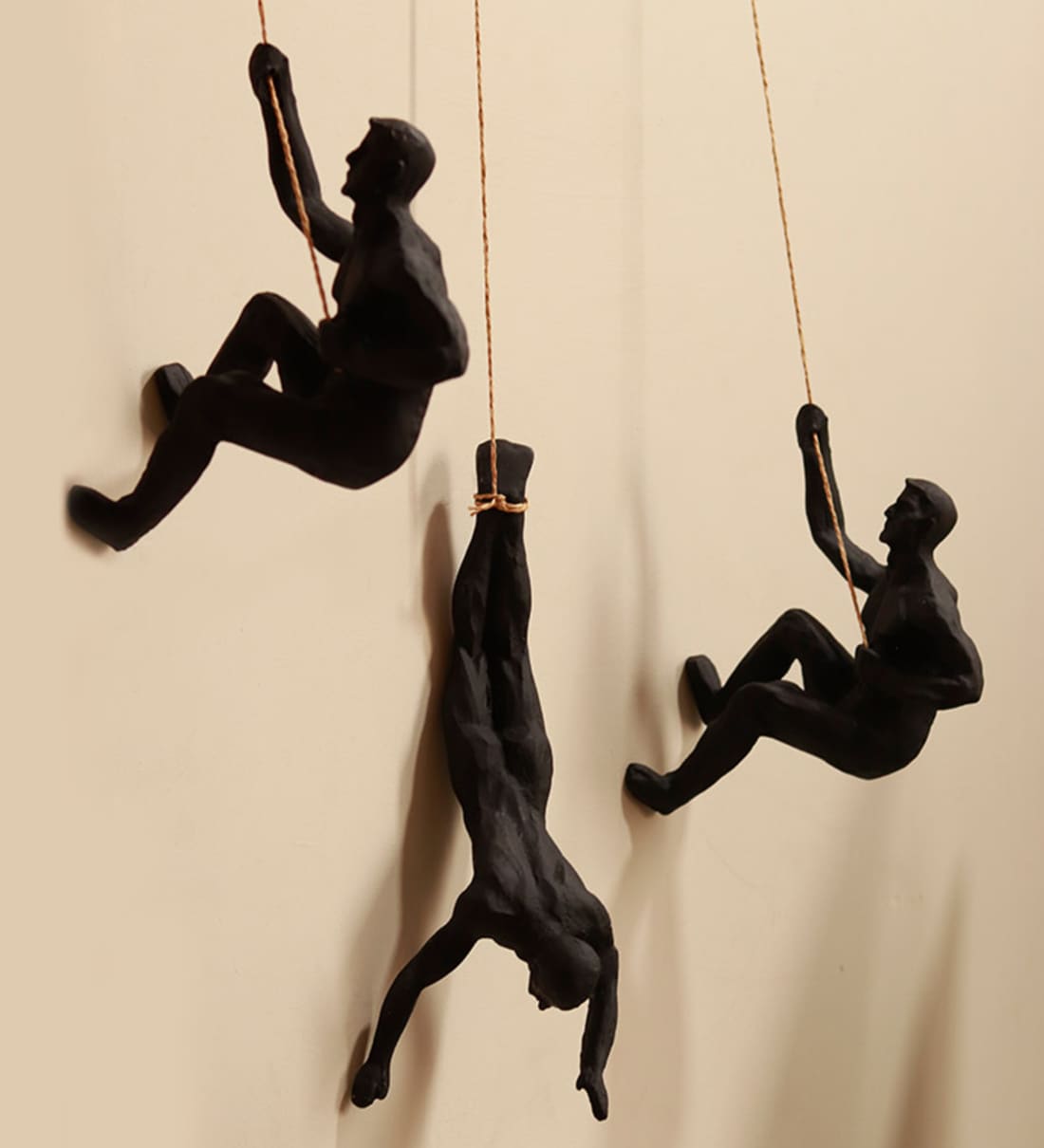 Hanging Man Black Resin FigurinesShare By ArteCasa